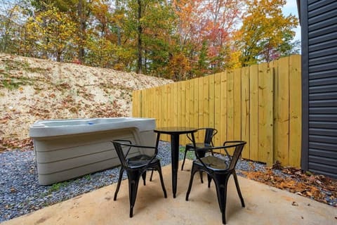 Your Outdoor Hot Tub Retreat awaits! Unwind in style with bubbles and stunning fall views!