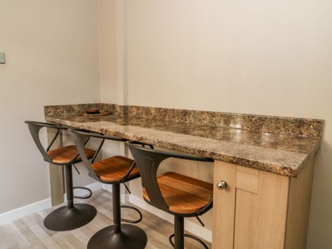 Fridge, electric kettle, toaster, cookware/dishes/utensils