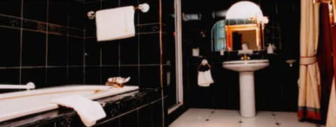 Superior Double or Twin Room | Bathroom | Combined shower/tub, designer toiletries, hair dryer, bathrobes