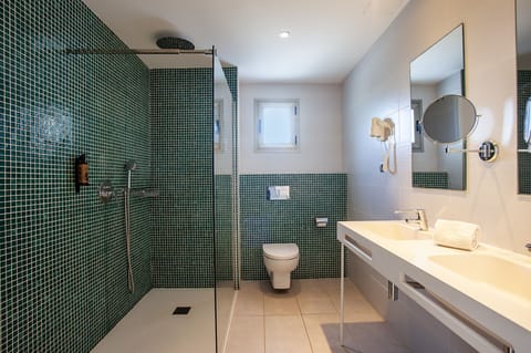 Quadruple Room, Balcony | Bathroom | Shower, free toiletries, hair dryer, towels