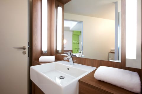 Eco-friendly toiletries, hair dryer, towels