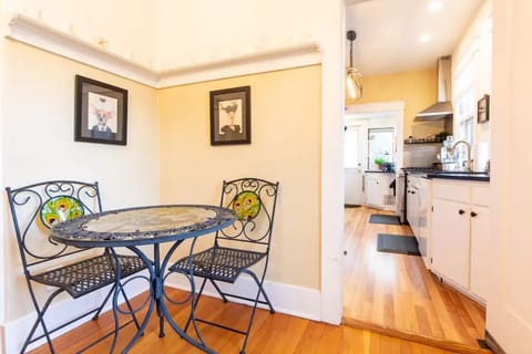 Third chair available in dining room closet.  Access to basement & washer/dryer.