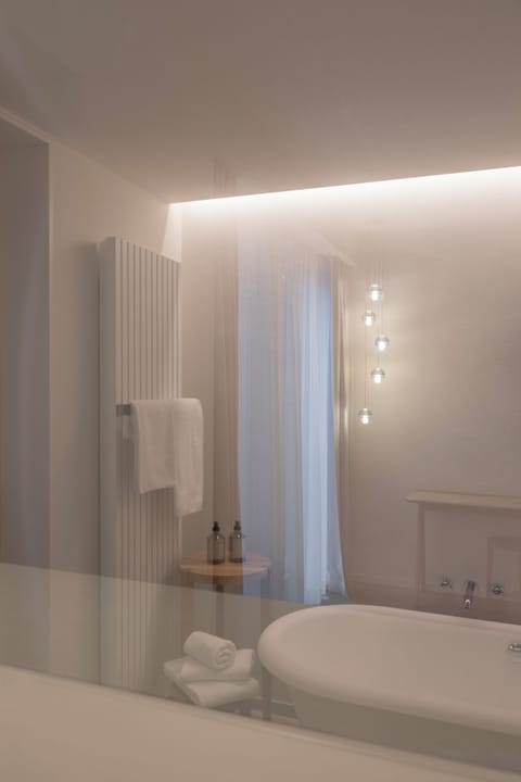 Penthouse (06 - Suite) | Bathroom | Rainfall showerhead, hair dryer, slippers, towels