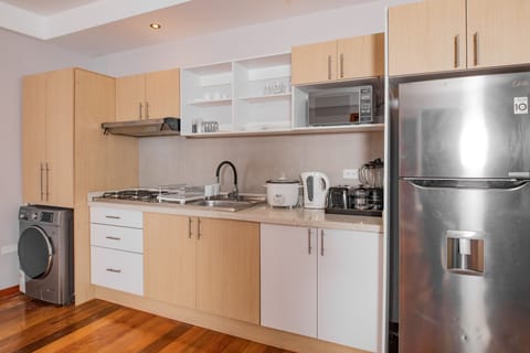 Family Apartment | Private kitchen | Fridge, microwave, coffee grinder, cookware/dishes/utensils