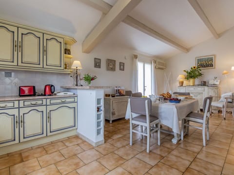 Cabinetry, Furniture, Countertop, Table, Chair, Wood, Building, Interior Design, Lighting, Houseplant