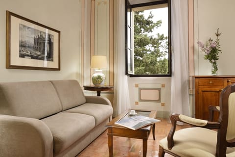 Premier Suite | Living area | Flat-screen TV