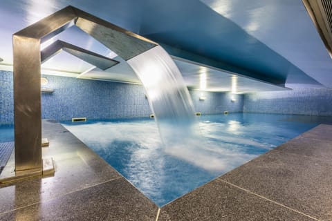 Indoor pool, seasonal outdoor pool, pool umbrellas, sun loungers