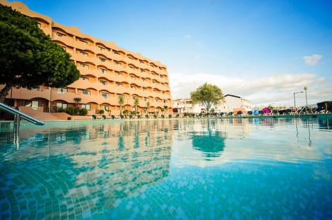 Indoor pool, outdoor pool, pool umbrellas