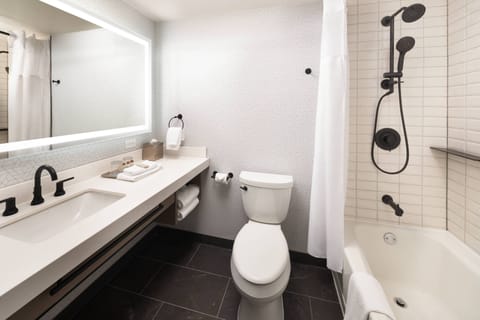 Combined shower/tub, designer toiletries, hair dryer, bathrobes