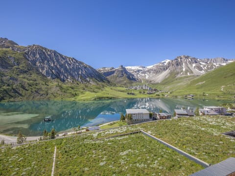 Sky, Water, Mountain, Natural Landscape, Highland, Grass, Lake, Bank, Plant, Slope