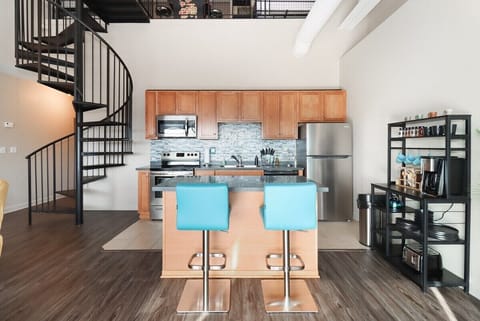 Sit at the island in the kitchen for a nice meal  