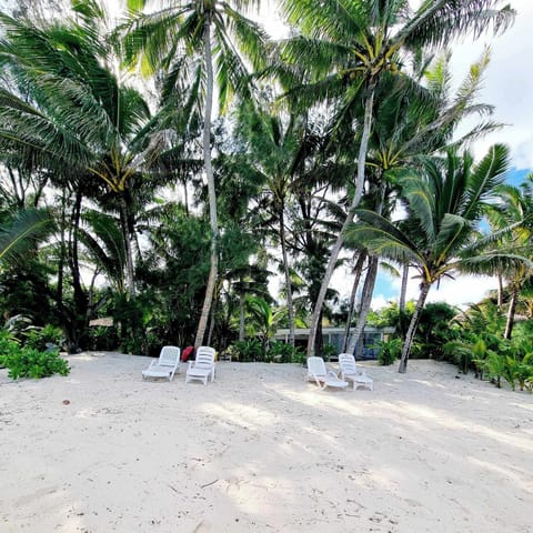 Private beach, white sand, sun loungers, beach towels