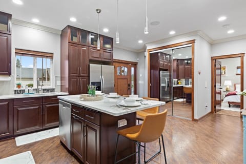 Welcome to our main floor. From the serenity of the master ensuite to the culinary delights of the fully-equipped kitchen and dining area, every corner is designed for your utmost relaxation. A powder room adds a touch of convenience to your stay.