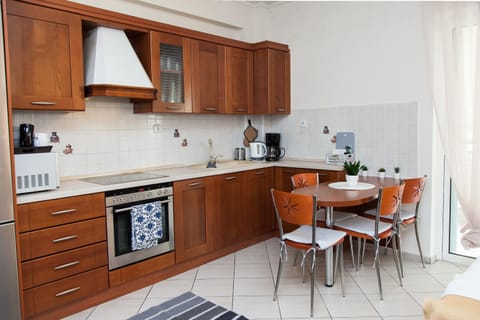 Apartment | Private kitchen | Full-size fridge, microwave, oven, stovetop