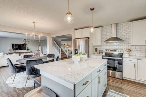 Luxury awaits! Professionally designed home centrally located on the Carmel/Noblesville border. 