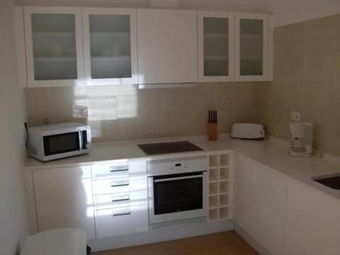 Villa | Private kitchen | Fridge, microwave, coffee/tea maker, electric kettle