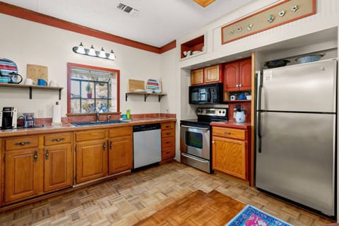 The kitchen box window is one of the best spots to watch the neighborhood deer roam the streets and adjacent park. .