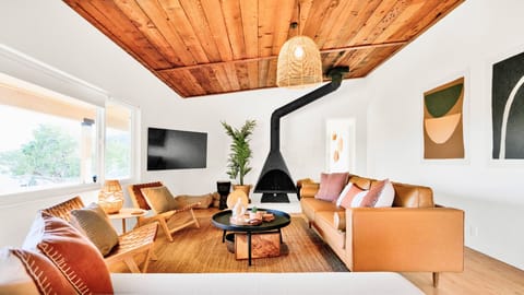 Brand new living room with a sofa bed. You'll find plenty of games and instrumnt