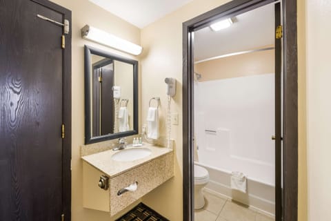 Standard Room, 2 Queen Beds, Non Smoking | Bathroom | Separate tub and shower, rainfall showerhead, hair dryer, towels