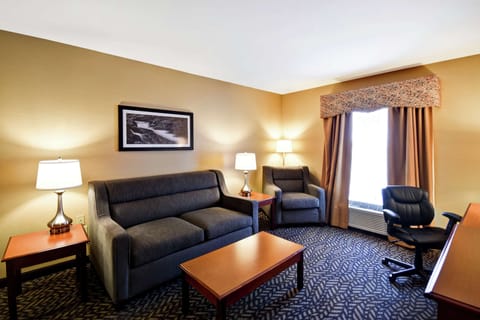 Suite, 1 King Bed, Non Smoking | Down comforters, desk, laptop workspace, iron/ironing board