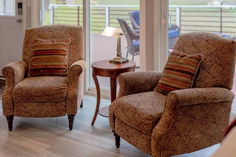 Sit back and relax or enjoy an intimate conversation in the wingback accent chairs.