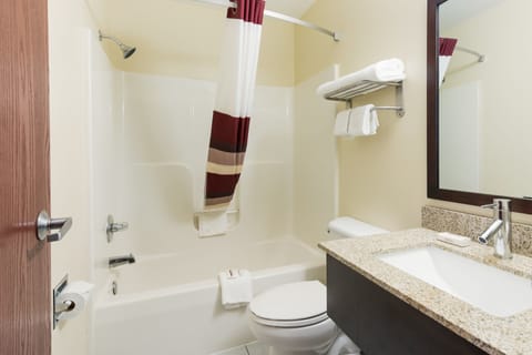 Superior Room, 1 King Bed, Non Smoking | Bathroom | Combined shower/tub, free toiletries, hair dryer, towels