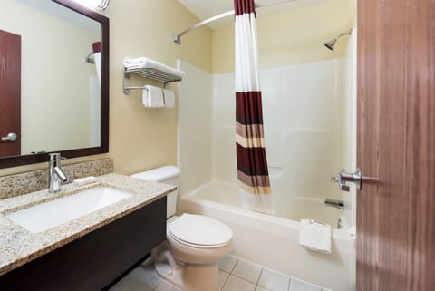 Suite, 1 King Bed, Non Smoking | Bathroom | Combined shower/tub, free toiletries, hair dryer, towels