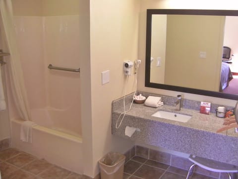 Room, 1 King Bed, Accessible | Bathroom | Hair dryer, towels