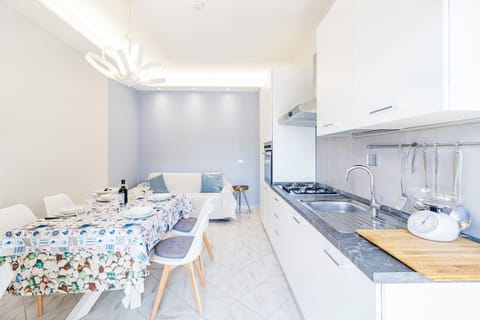 Family Apartment, 2 Bedrooms (Bedo House Beach Front) | Private kitchen | Fridge, oven, stovetop, dishwasher