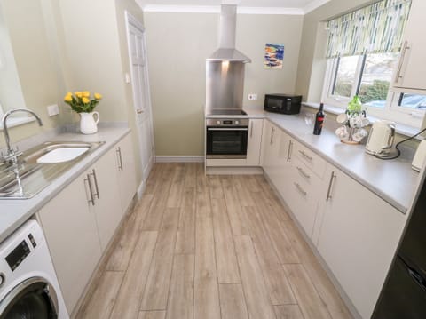 Fridge, electric kettle, toaster, cookware/dishes/utensils