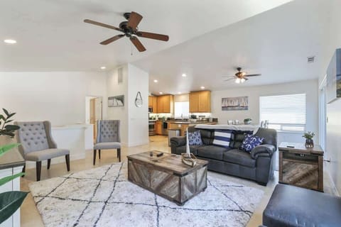 Living Room with sleeper couch, kitchen and laundry upstairs. Master bedroom upstairs.