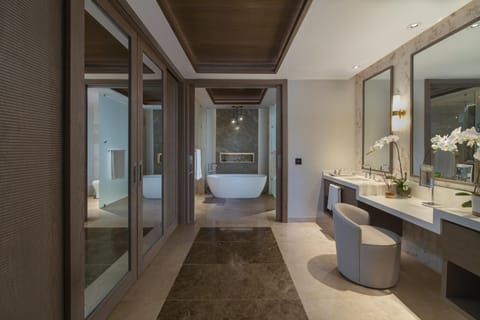 Two Bedroom Luxury Premier Suite | Bathroom | Deep soaking tub, designer toiletries, hair dryer, bathrobes