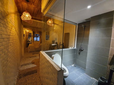 Separate tub and shower, hydromassage showerhead, hair dryer, bathrobes