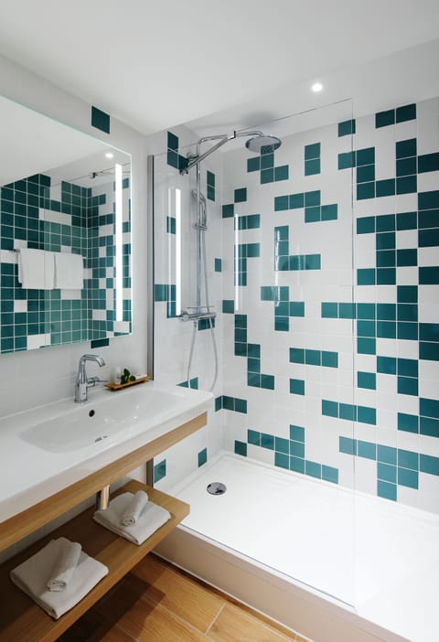 Eco-friendly toiletries, hair dryer, bathrobes, slippers