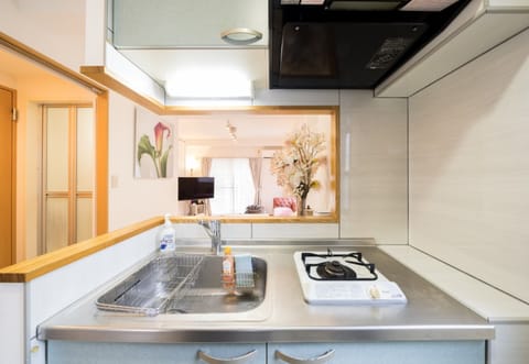 Basic Quadruple Room | Private kitchen | Full-size fridge