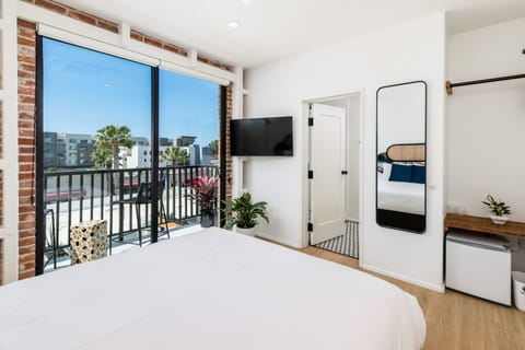 Room, 1 Queen Bed, Balcony, City View (Room 302) | 1 bedroom, in-room safe, individually decorated, individually furnished