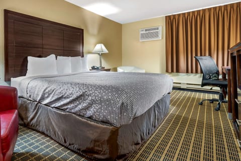 Room, 1 King Bed, Non Smoking | In-room safe, desk, iron/ironing board, rollaway beds