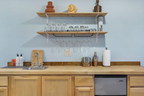 Mix up drinks and snacks at the full wet bar 