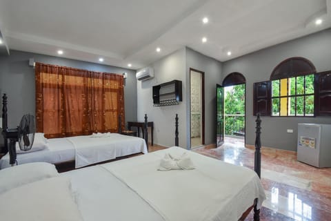 Superior Quadruple Room | Minibar, individually decorated, individually furnished, bed sheets