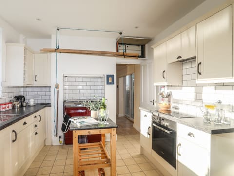 Fridge, dishwasher, cookware/dishes/utensils