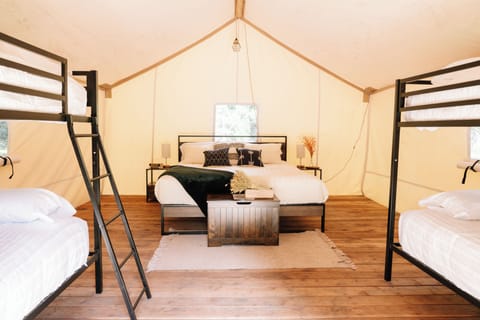 Yellowstone Safari Tent Sleeps 6 w/ King | Premium bedding, down comforters, individually furnished, bed sheets