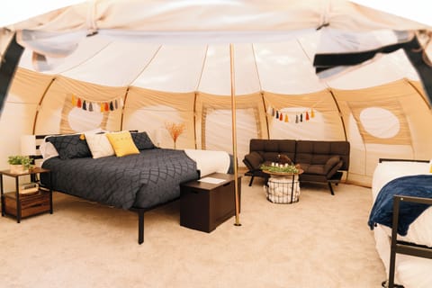 Family Tent (Yellowstone Fam Tent Sleeps 5 w/ King) | Premium bedding, down comforters, individually furnished, bed sheets