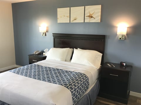 Deluxe Suite, Non Smoking, Ocean View | Down comforters, desk, soundproofing, iron/ironing board