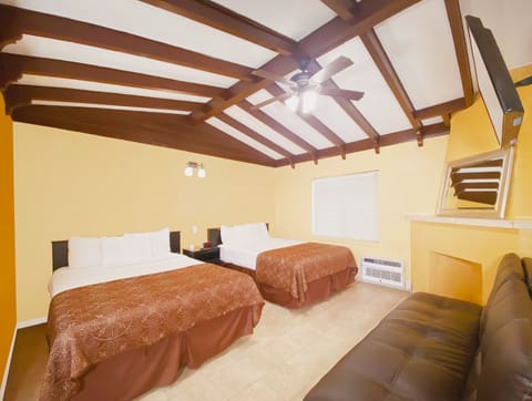 Deluxe Room, Multiple Beds, Non Smoking, Refrigerator & Microwave | Soundproofing, iron/ironing board, free WiFi, bed sheets