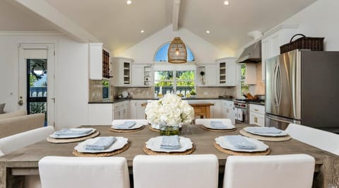 Large dining table for 8 with more seating on the island 