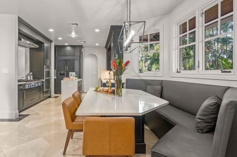 The breakfast nook is conveniently connected to the kitchen which seats eight.