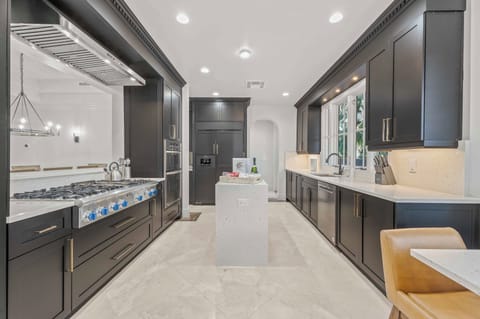 The Chefs kitchen has all updated appliance open to two dining and two living areas.