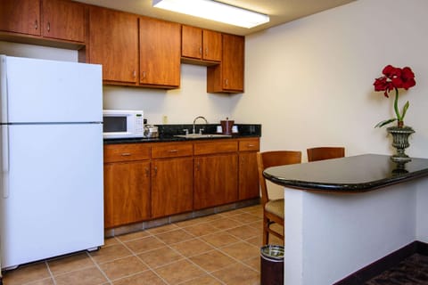 Suite, 1 King Bed, Non Smoking | Private kitchen | Fridge, microwave, coffee/tea maker