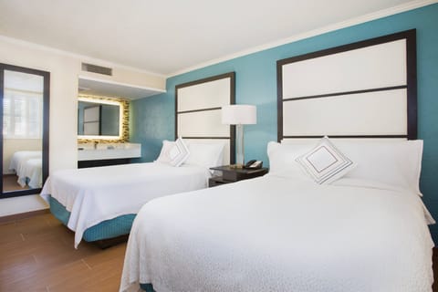 Suite, 2 Double Beds | Pillowtop beds, in-room safe, iron/ironing board, free cribs/infant beds