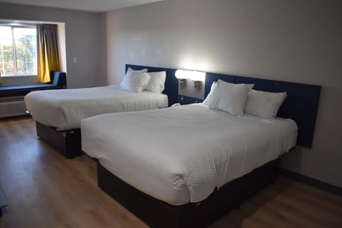 Deluxe Room, 2 Queen Beds, Non Smoking | Egyptian cotton sheets, premium bedding, pillowtop beds, in-room safe